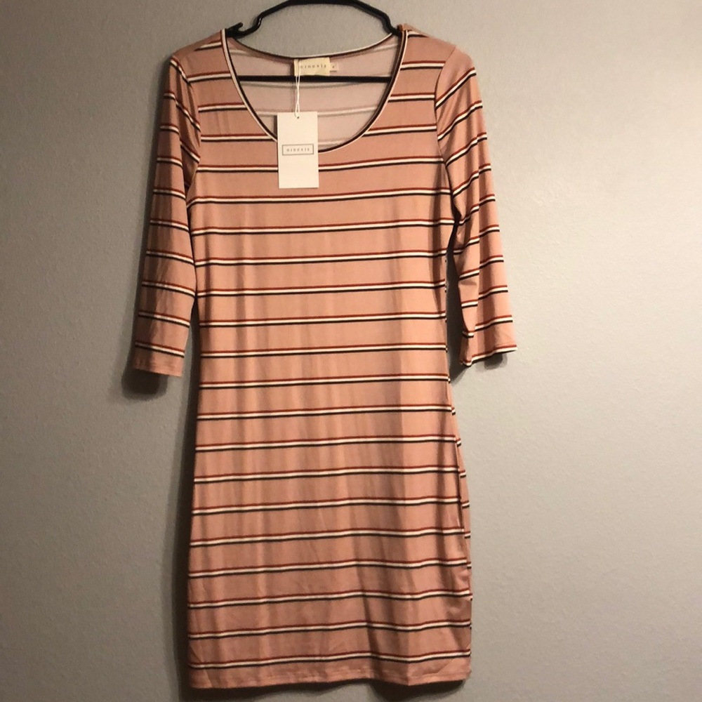 Body con dress.  New with tags. Size M